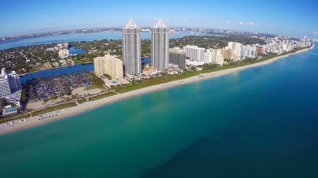 Aerial video footage of oceanfront condominiums in Miami