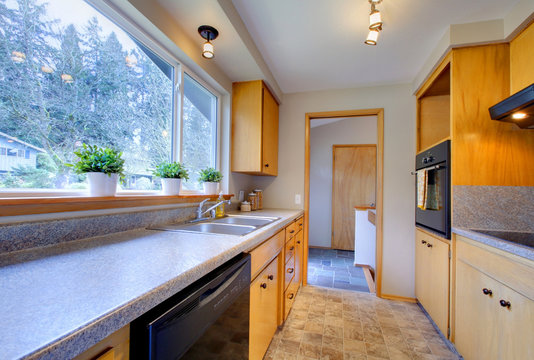 Modern kitchen with wide window