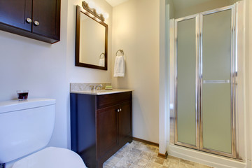 Naklejka na ściany i meble Elegant dark brown tones bathroom