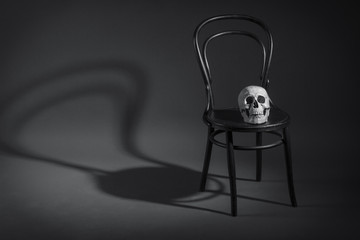 Retro chair on a human skull.