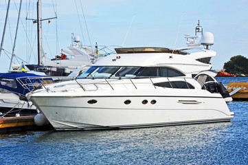 Fototapeta premium White motor yacht over harbor pier, Odessa, Ukraine