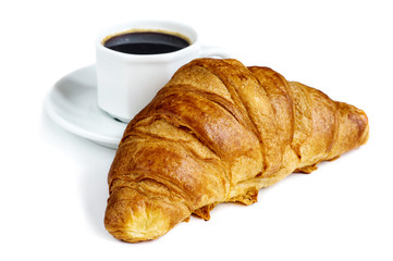 Cup of coffee and  croissant on white background