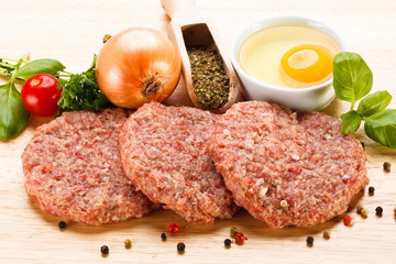Raw minced pork chops meat on white background