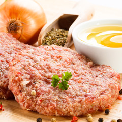 Raw minced pork chops meat on white background