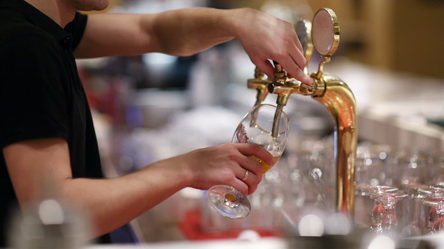Draft beer pouring