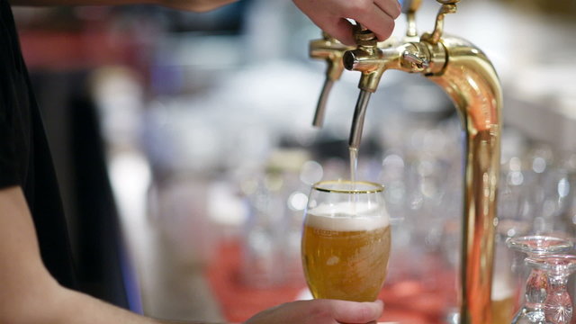 Draft beer pouring