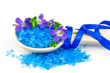 Wooden spoon with blue bath salt © Veselka