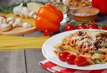 Pasta bolognese on the wooden table