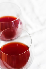 Glass of red wine with white background