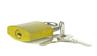 A golden coloured padlock with keys on a white background