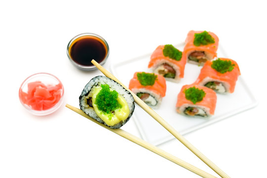Japanese cuisine - rolls on white background