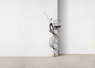 businessman on spiral staircase