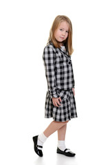 little girl wearing checkered dress