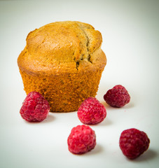 Raspberry muffin isolated on white background