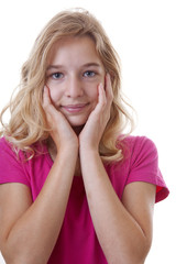 Portrait of girl who looks surprised over white background