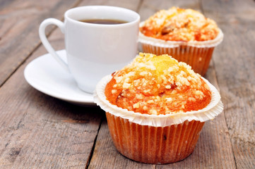 coffee berry muffins on wooden table