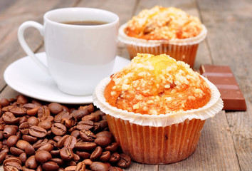 cup of coffee with muffin and chocolate