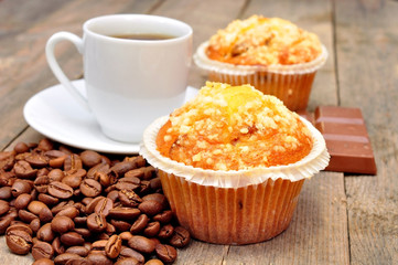 cup of coffee with muffin and chocolate