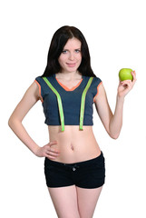 Athletic girl with measuring tape and apple. isolation