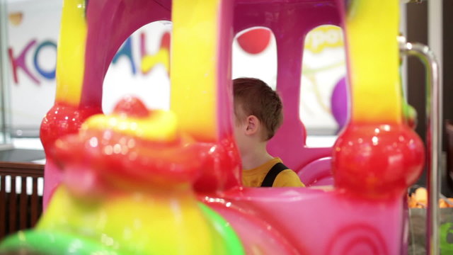Boy in amusement train