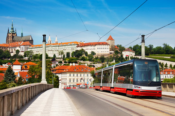 Modern tram on the Manesuv most