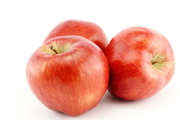Red apples on white background