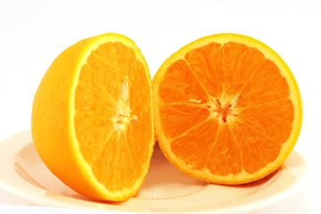 Juicy orange on a plate