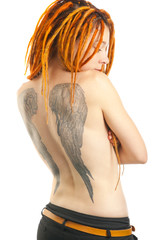 Portrait of young beautiful woman with tattoo