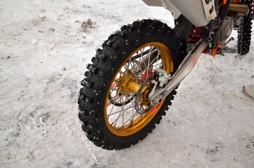 motocross motorcycle wheel with thorns