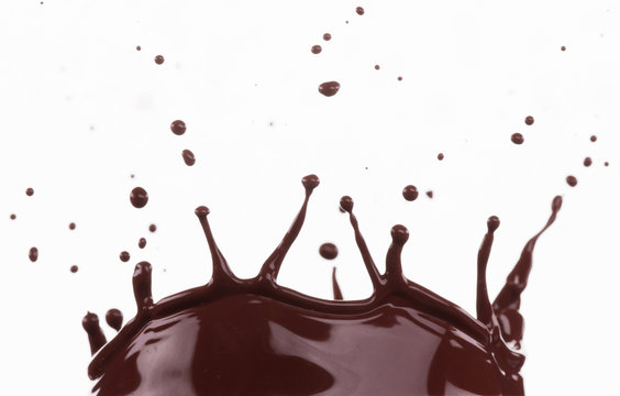 Chocolate splash over white background