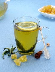 Green tea with sugared ginger and candy canes