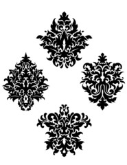 Four different foliate arabesque motifs