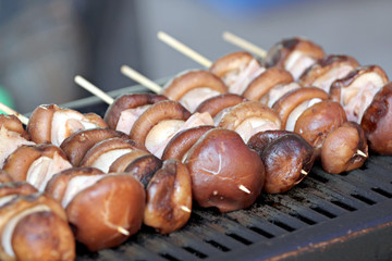 Shiitake mushrooms on the grill.