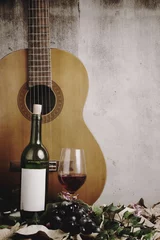 Fotobehang Eetkamer Still life of red wine bottle and wine glass with acoustic guita  © kromkrathog