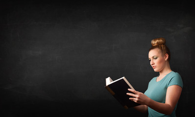 Young lady reading a book