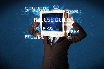 Monitor head person with hacker type of signs on the screen