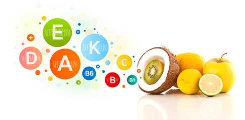Healthy fruits with colorful vitamin symbols and icons