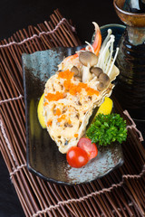 japanese cuisine. grilled shell fish on the background