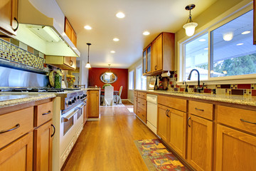 Furnished bright light brown kitchen room