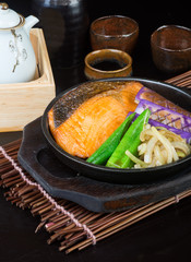 japanese cuisine. hot plate fish on the background