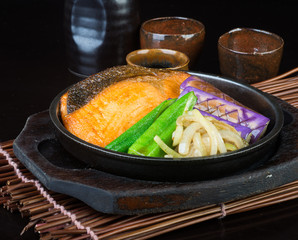 japanese cuisine. hot plate fish on the background
