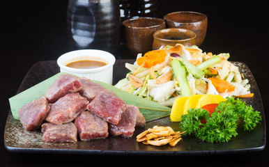 japanese cuisine. beef cube on the background
