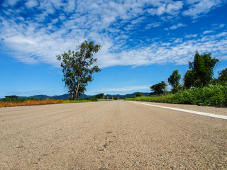 Asphalt road with blue sky