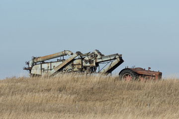Fototapeta premium Old Tractor and Threshing Machine