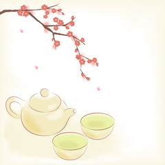 Traditional oriental teapot and cups with plum blossom