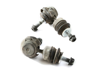 Pair worthless worn stabilizer links isolated on white backgroun