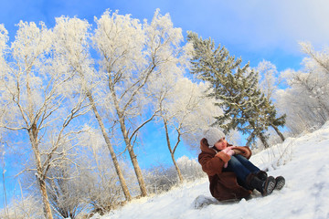 romantic girl deep in thoughts and freezing winter