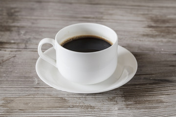 Coffee cup center on wooden table