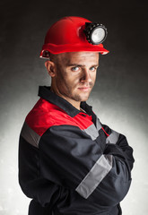 Portrait of serious coal miner