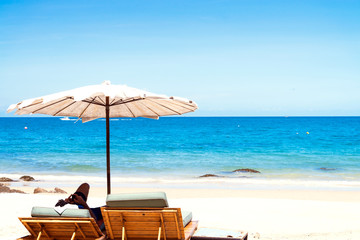 Beach chair and umbrella on sand beach. - 60494802